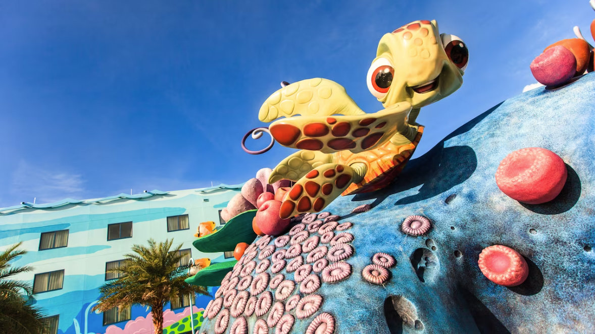 squirt figure on a rock outside at art of animation resort
